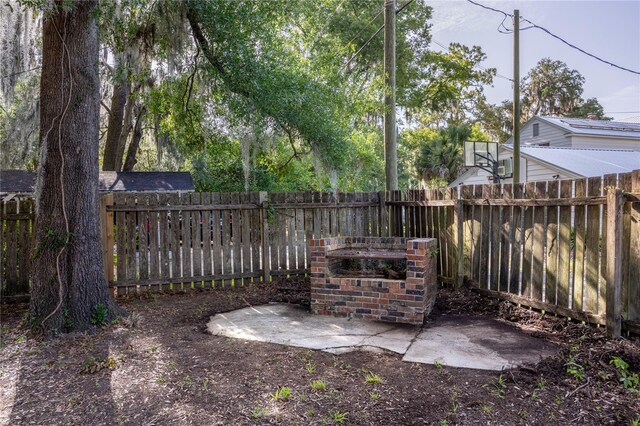 2147 NW 7th Pl, Gainesville, FL 32603 - fenced backyard featuring a patio area