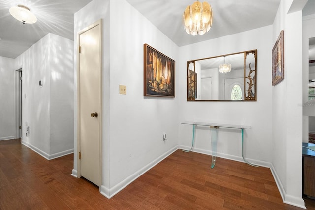 2809 SW 81st St, Gainesville, FL 32608 - hall with a chandelier and wood finished floors