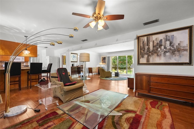 2809 SW 81st St, Gainesville, FL 32608 - living area featuring wood finished floors and ceiling fan
