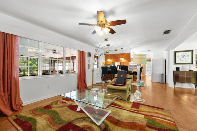 2809 SW 81st St, Gainesville, FL 32608 - living area featuring a ceiling fan and light wood-type flooring