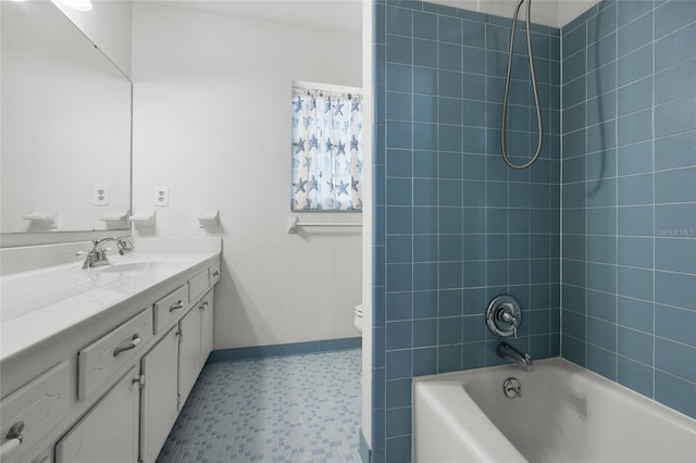 2809 SW 81st St, Gainesville, FL 32608 - full bathroom with vanity, tile patterned floors, and shower / bathtub combination