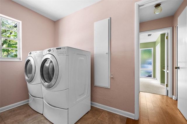 2809 SW 81st St, Gainesville, FL 32608 - laundry room with separate washer and dryer and baseboards