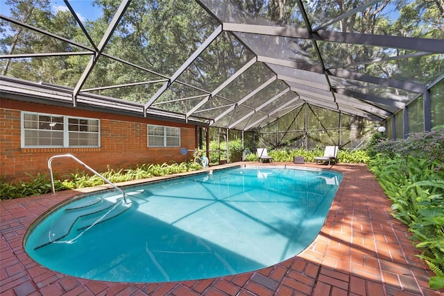 2809 SW 81st St, Gainesville, FL 32608 - swimming pool featuring a patio and glass enclosure