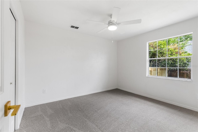 10943 NW 34th Pl, Gainesville, FL 32606 - carpeted empty room with a ceiling fan and baseboards