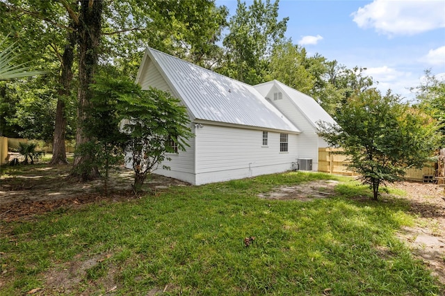 10943 NW 34th Pl, Gainesville, FL 32606 - view of home's exterior with a metal roof