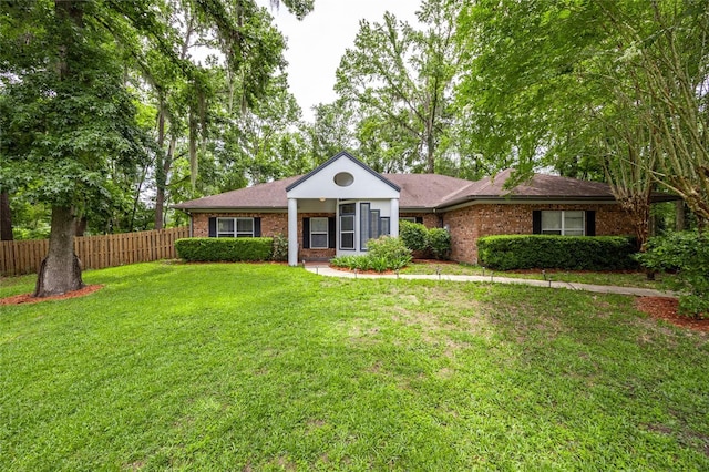 9911 NW 24th Pl, Gainesville, FL 32606 - ranch-style house featuring brick siding
