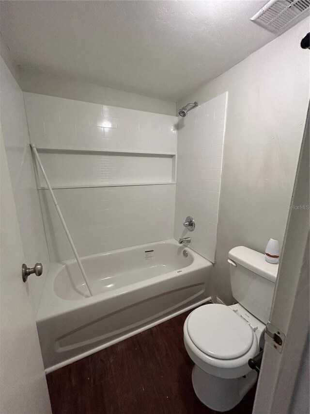 2811 SW Archer Rd Unit X203, Gainesville, FL 32608 - bathroom with shower / washtub combination and wood finished floors