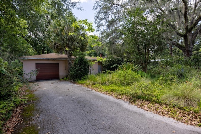 1814 NE 7th St, Gainesville, FL 32609 - garage with asphalt driveway