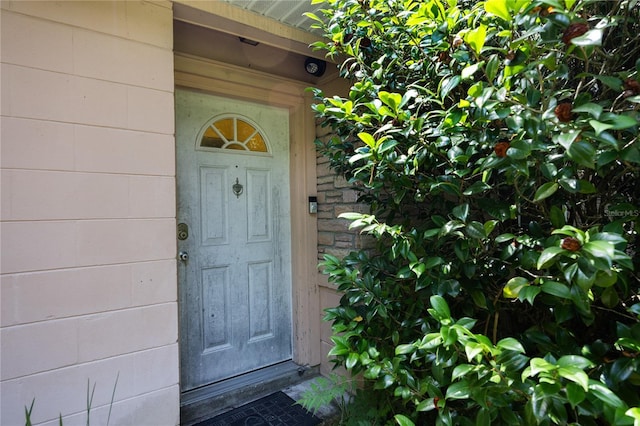 1814 NE 7th St, Gainesville, FL 32609 - entrance to property featuring concrete block siding