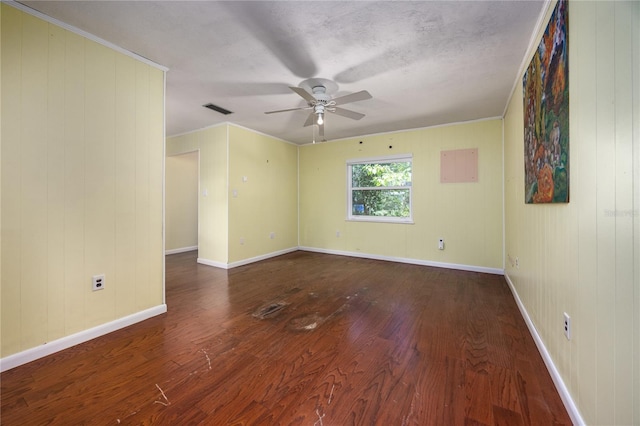 1814 NE 7th St, Gainesville, FL 32609 - spare room featuring ceiling fan, wood finished floors, and ornamental molding