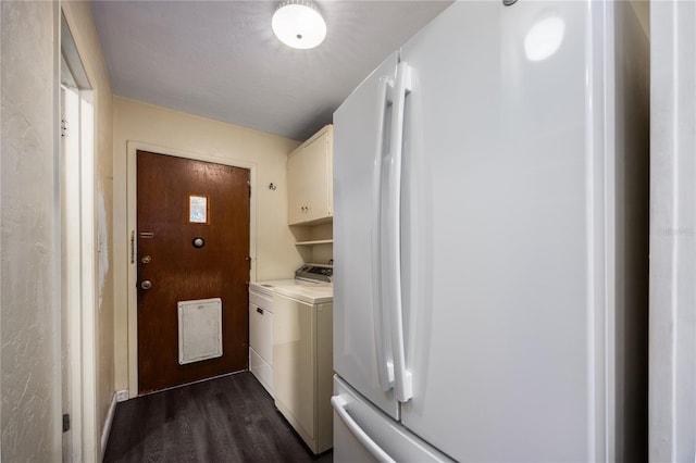 1814 NE 7th St, Gainesville, FL 32609 - washroom with independent washer and dryer, dark wood-style floors, and cabinet space