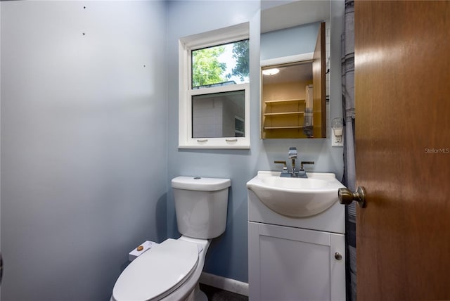 1814 NE 7th St, Gainesville, FL 32609 - bathroom with vanity and toilet