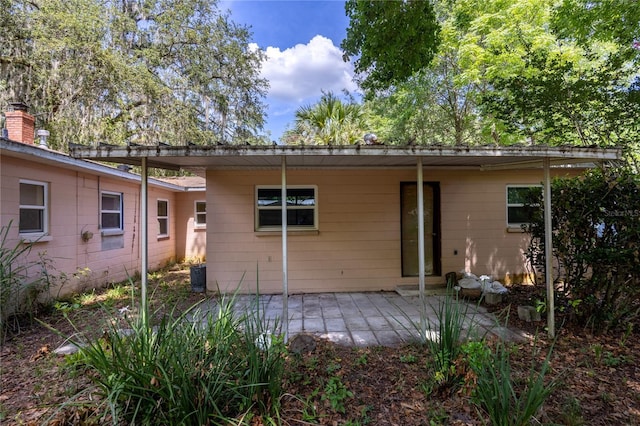 1814 NE 7th St, Gainesville, FL 32609 - back of house with a patio area