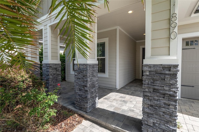 11890 SW 33rd Ln, Gainesville, FL 32608 - view of exterior entry featuring stone siding