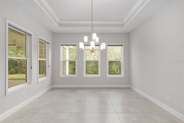 11890 SW 33rd Ln, Gainesville, FL 32608 - unfurnished dining area with a chandelier, a tray ceiling, light tile patterned flooring, and ornamental molding