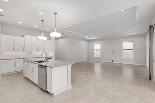 11890 SW 33rd Ln, Gainesville, FL 32608 - kitchen featuring dishwasher, a raised ceiling, tasteful backsplash, an island with sink, and recessed lighting