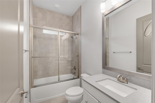 11890 SW 33rd Ln, Gainesville, FL 32608 - bathroom featuring vanity and combined bath / shower with glass door