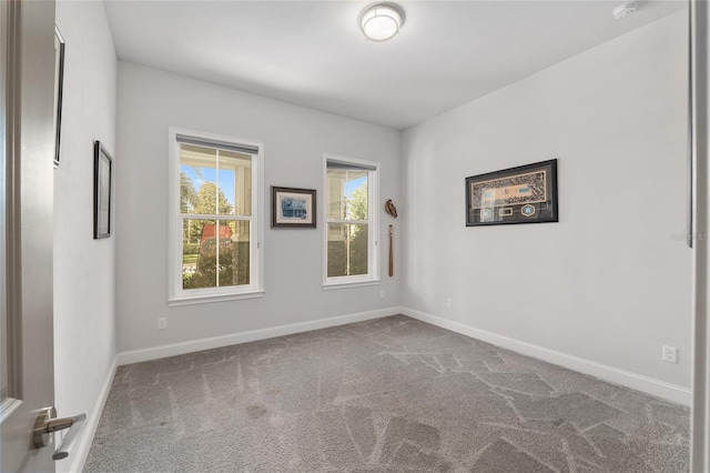 11890 SW 33rd Ln, Gainesville, FL 32608 - carpeted spare room featuring a smoke detector and baseboards