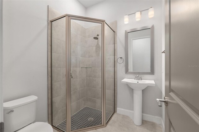 11890 SW 33rd Ln, Gainesville, FL 32608 - bathroom with a stall shower and tile patterned flooring
