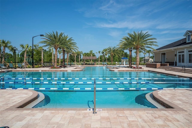11890 SW 33rd Ln, Gainesville, FL 32608 - community pool featuring french doors