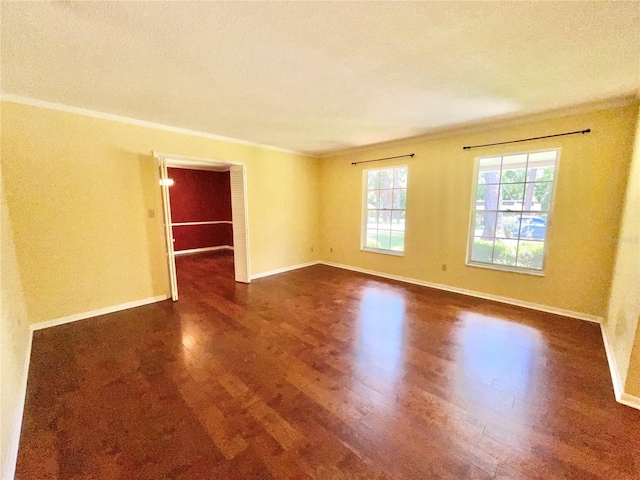 2268 NW 17th Ave, Gainesville, FL 32605 - unfurnished room with dark wood finished floors and ornamental molding