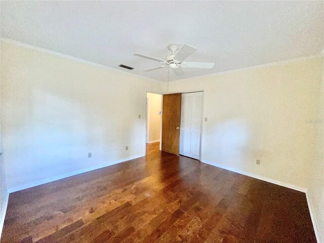 2268 NW 17th Ave, Gainesville, FL 32605 - empty room featuring ceiling fan, wood finished floors, and ornamental molding