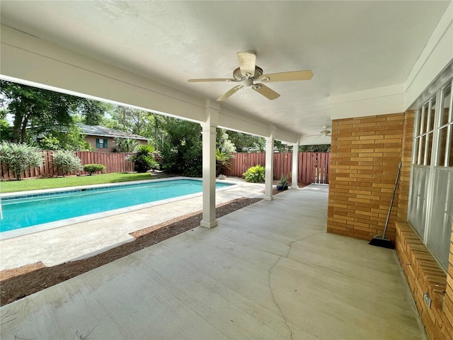 2268 NW 17th Ave, Gainesville, FL 32605 - view of pool featuring ceiling fan, a fenced backyard, and a patio