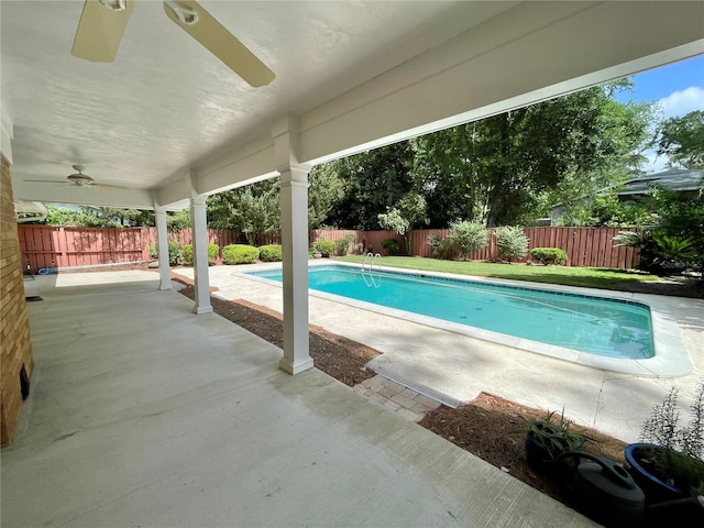 2268 NW 17th Ave, Gainesville, FL 32605 - view of pool with ceiling fan, a fenced backyard, and a patio