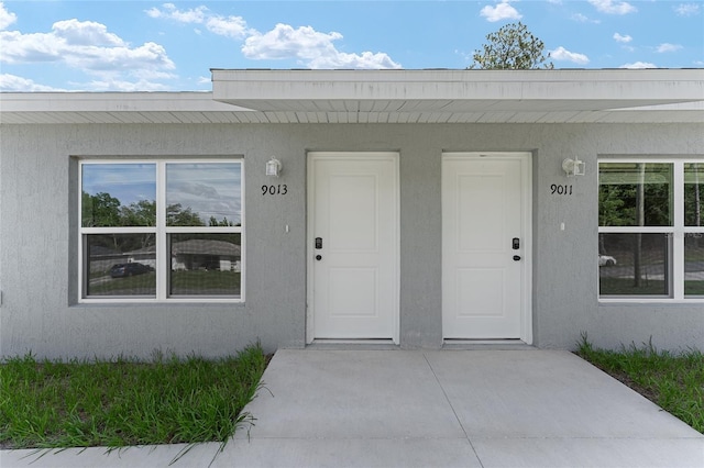 9011 N Travis Dr, Citrus Springs, FL 34434 - entrance to property with stucco siding