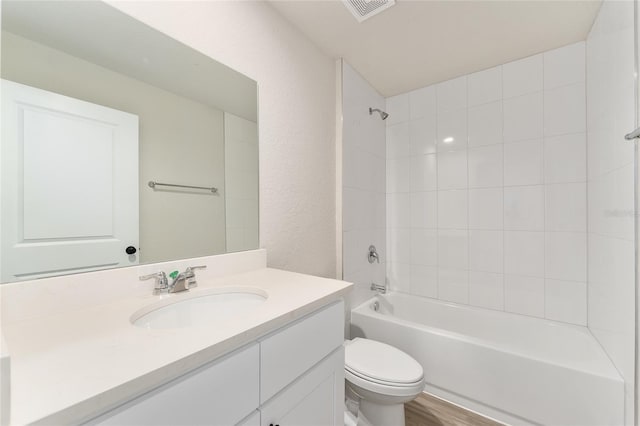 9011 N Travis Dr, Citrus Springs, FL 34434 - full bath featuring vanity, bathtub / shower combination, and wood finished floors