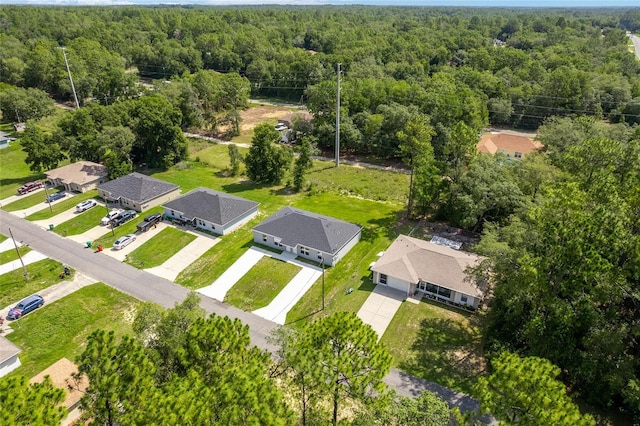 9011 N Travis Dr, Citrus Springs, FL 34434 - drone / aerial view of a heavily wooded area