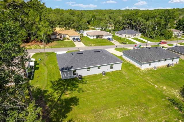 9011 N Travis Dr, Citrus Springs, FL 34434 - aerial perspective of suburban area with a forest