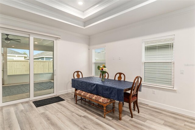 1425 SW 67th Dr, Gainesville, FL 32607 - dining area with light wood-type flooring, ornamental molding, a tray ceiling, ceiling fan, and recessed lighting