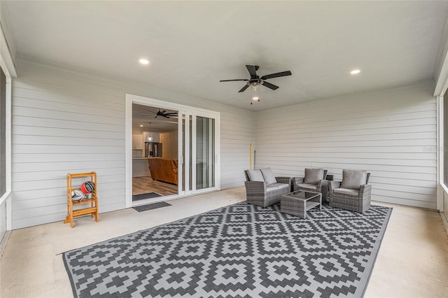 1425 SW 67th Dr, Gainesville, FL 32607 - sitting room featuring wood walls, ceiling fan, and recessed lighting