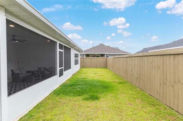 1425 SW 67th Dr, Gainesville, FL 32607 - fenced backyard featuring a sunroom