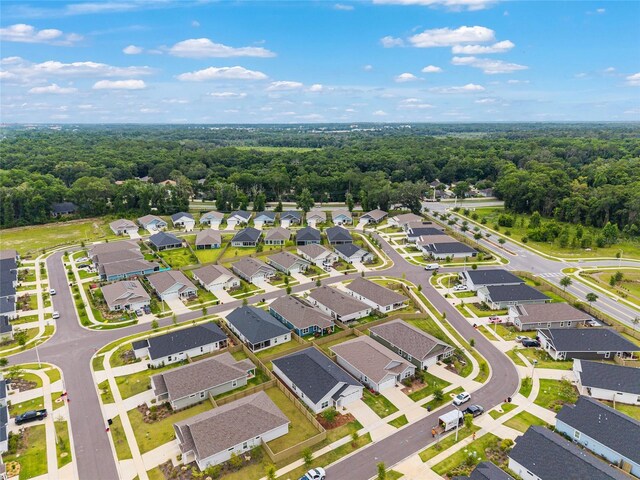 1425 SW 67th Dr, Gainesville, FL 32607 - aerial view of residential area featuring a heavily wooded area