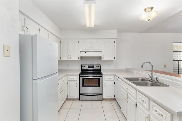 2963 SW 40th Ave, Gainesville, FL 32608 - kitchen featuring white appliances, light tile patterned floors, under cabinet range hood, white cabinetry, and light countertops