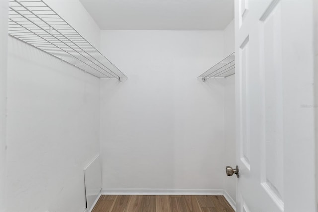 2963 SW 40th Ave, Gainesville, FL 32608 - spacious closet featuring wood finished floors