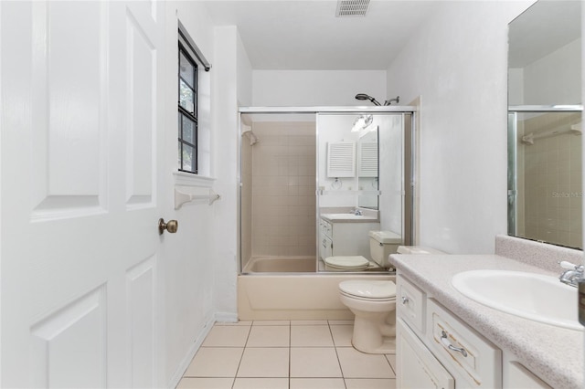 2963 SW 40th Ave, Gainesville, FL 32608 - bathroom with vanity, tile patterned floors, and shower / bath combination with glass door