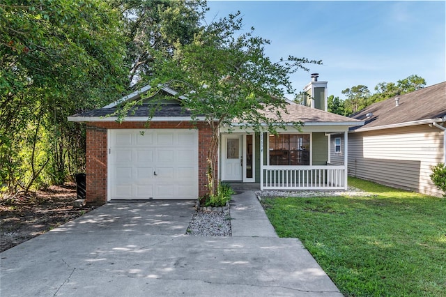 2963 SW 40th Ave, Gainesville, FL 32608 - view of front of property featuring a porch, concrete driveway, brick siding, a front lawn, and a chimney