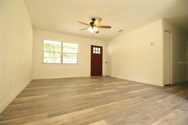 706 NE 24th St, Gainesville, FL 32641 - spare room with a ceiling fan and light wood-type flooring