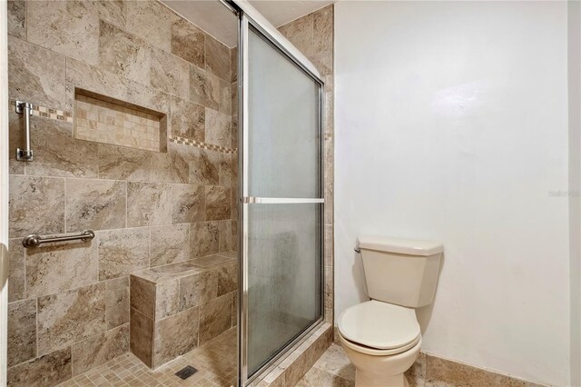820 NW 109th Dr, Gainesville, FL 32606 - full bathroom with a shower stall and toilet