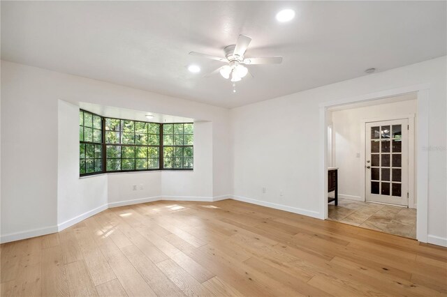 820 NW 109th Dr, Gainesville, FL 32606 - empty room featuring ceiling fan and light wood-style floors