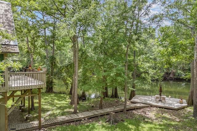 174 SW Meridian Ct, Fort White, FL 32038 - view of yard with a deck with water view