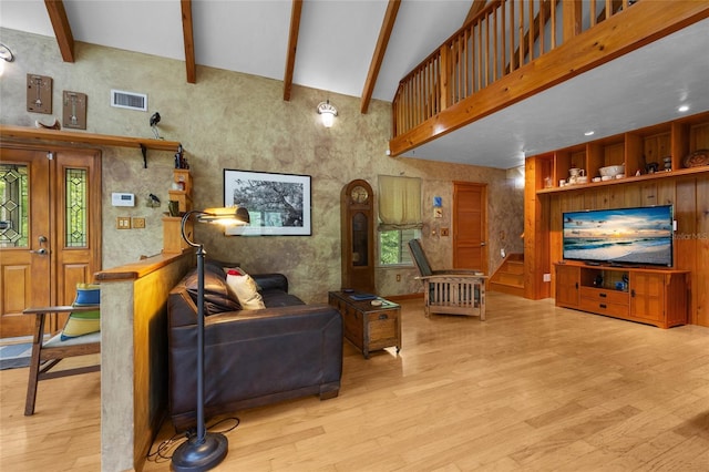 174 SW Meridian Ct, Fort White, FL 32038 - living room featuring wood finished floors, beam ceiling, and high vaulted ceiling