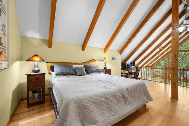 174 SW Meridian Ct, Fort White, FL 32038 - bedroom with wood finished floors and access to outside