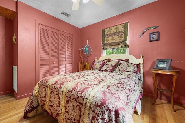 174 SW Meridian Ct, Fort White, FL 32038 - bedroom featuring a closet, wood finished floors, and ceiling fan