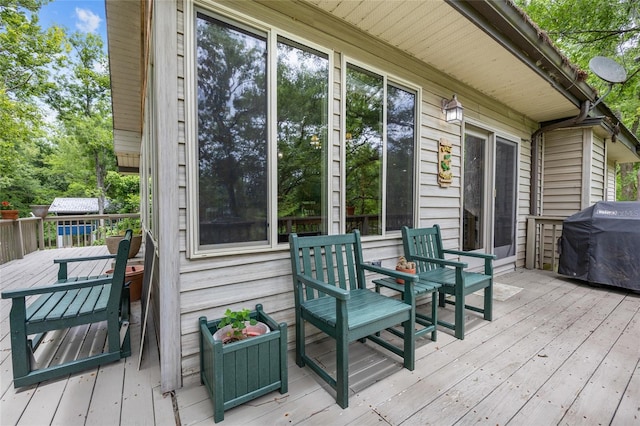 174 SW Meridian Ct, Fort White, FL 32038 - wooden deck featuring a grill