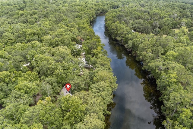 174 SW Meridian Ct, Fort White, FL 32038 - aerial view of property and surrounding area featuring a nearby body of water and a heavily wooded area