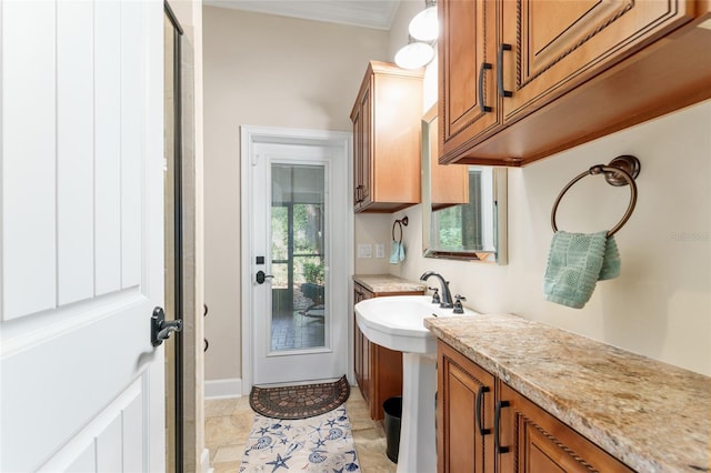 552 NW 136th St, Newberry, FL 32669 - bathroom featuring crown molding and baseboards